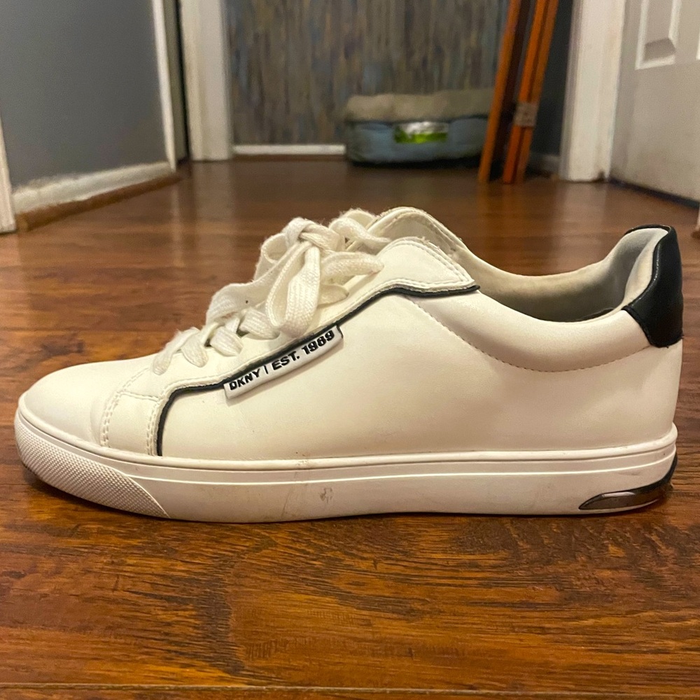 DKNY black and white sneakers.